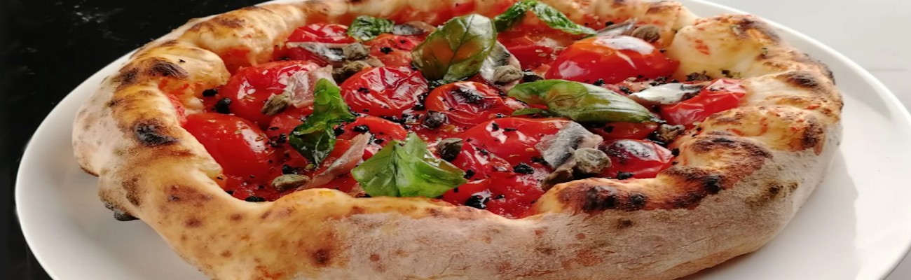 Pizza; Bien Disfrutada. Muy mal Escrita